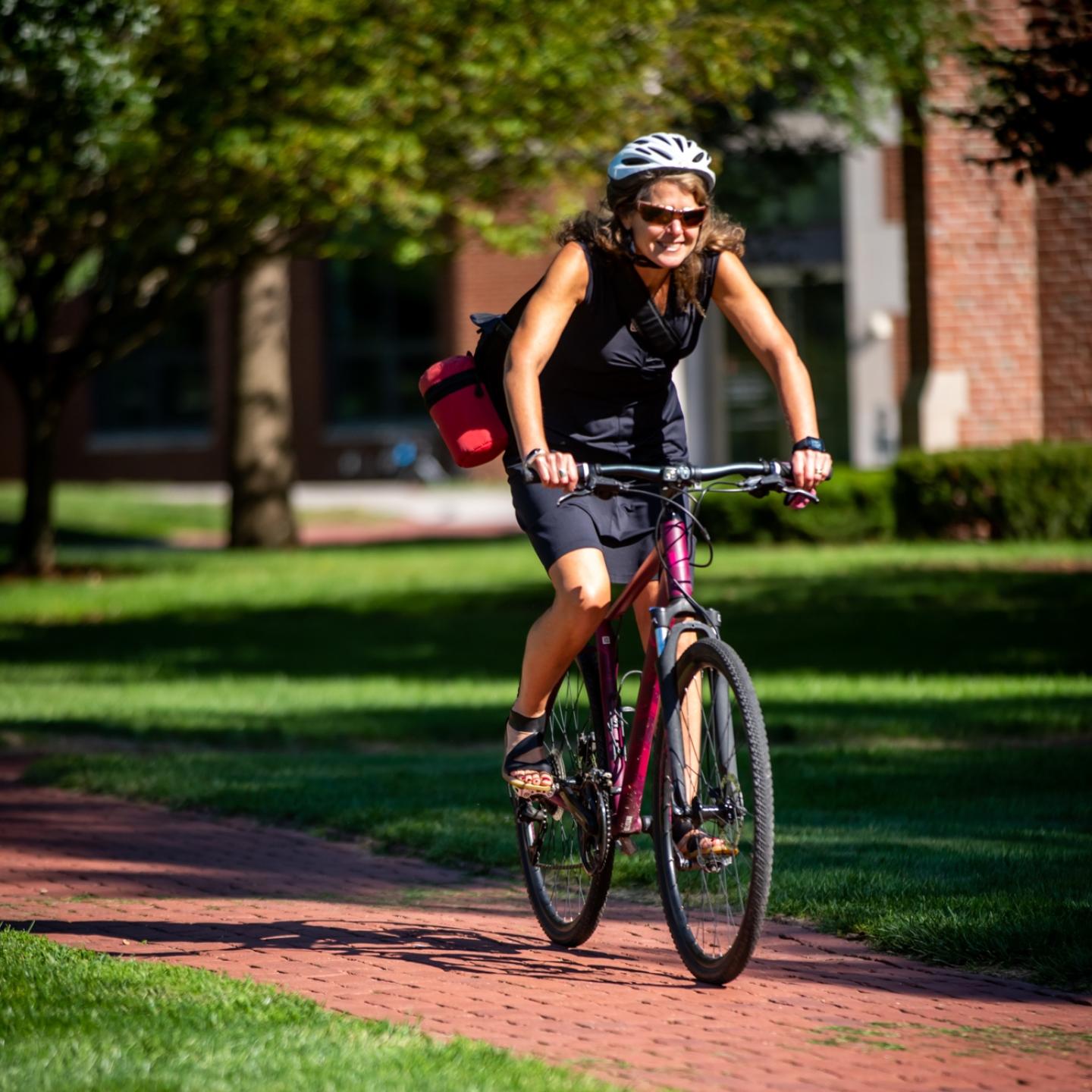 Kate Daniels riding a bicycle