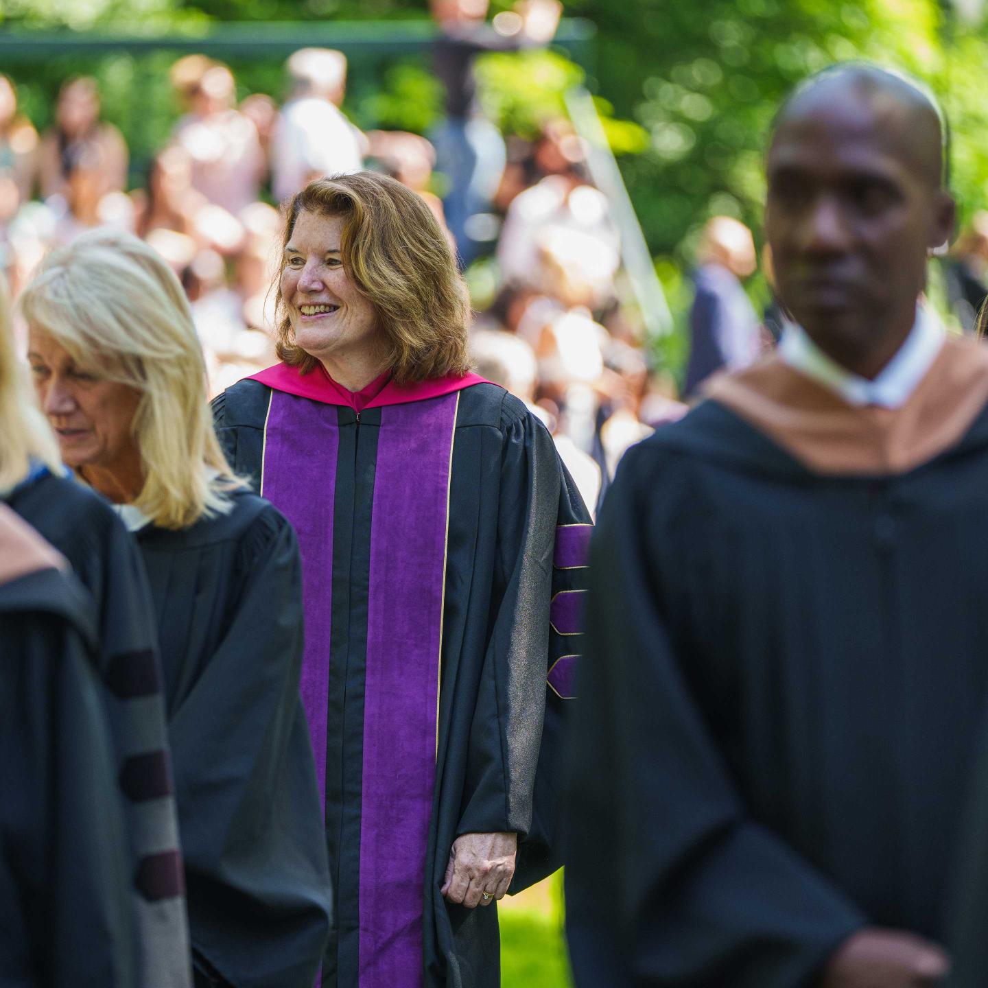 Rector Giles walking in during Graduation 2024