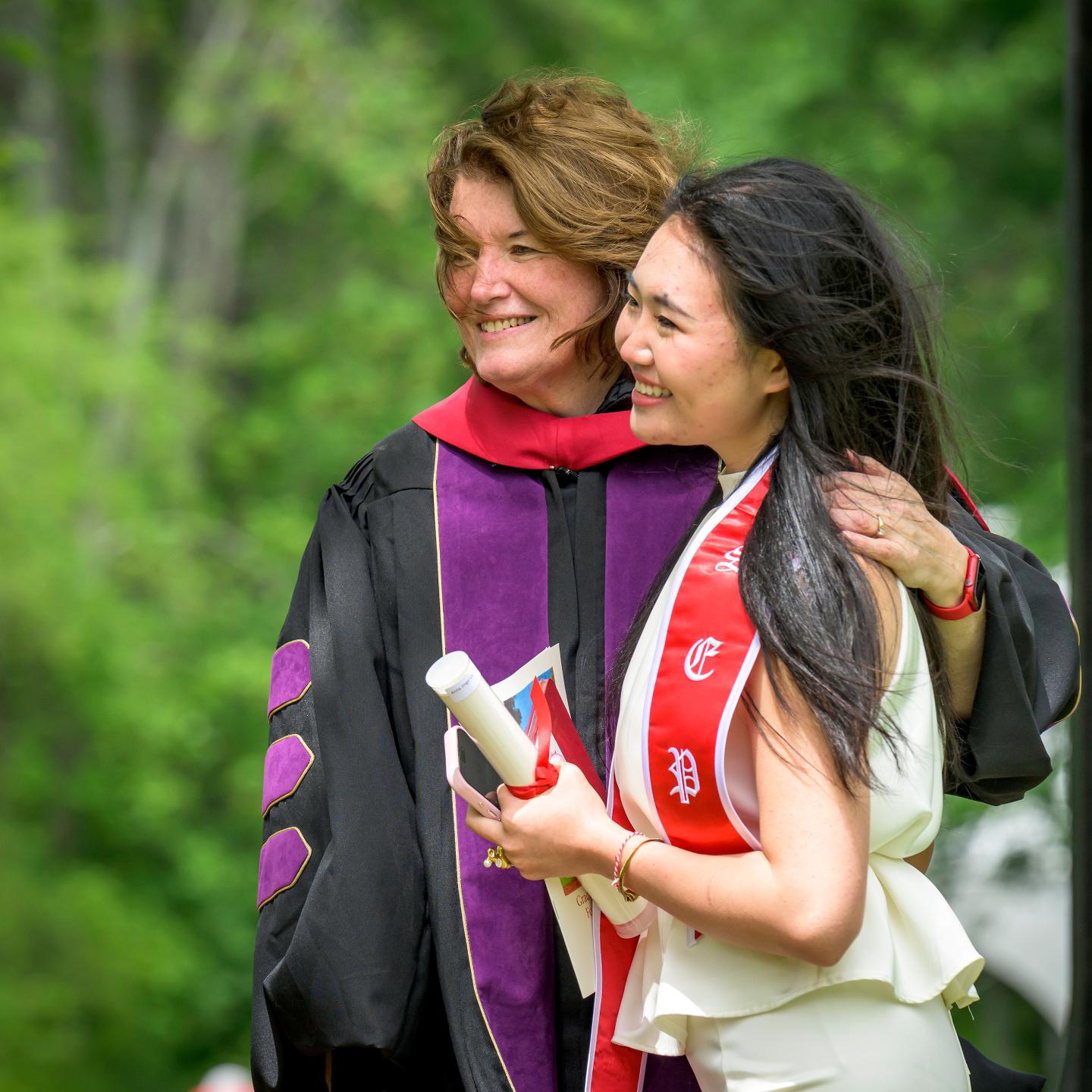 Kathy with a student at graduation 2025