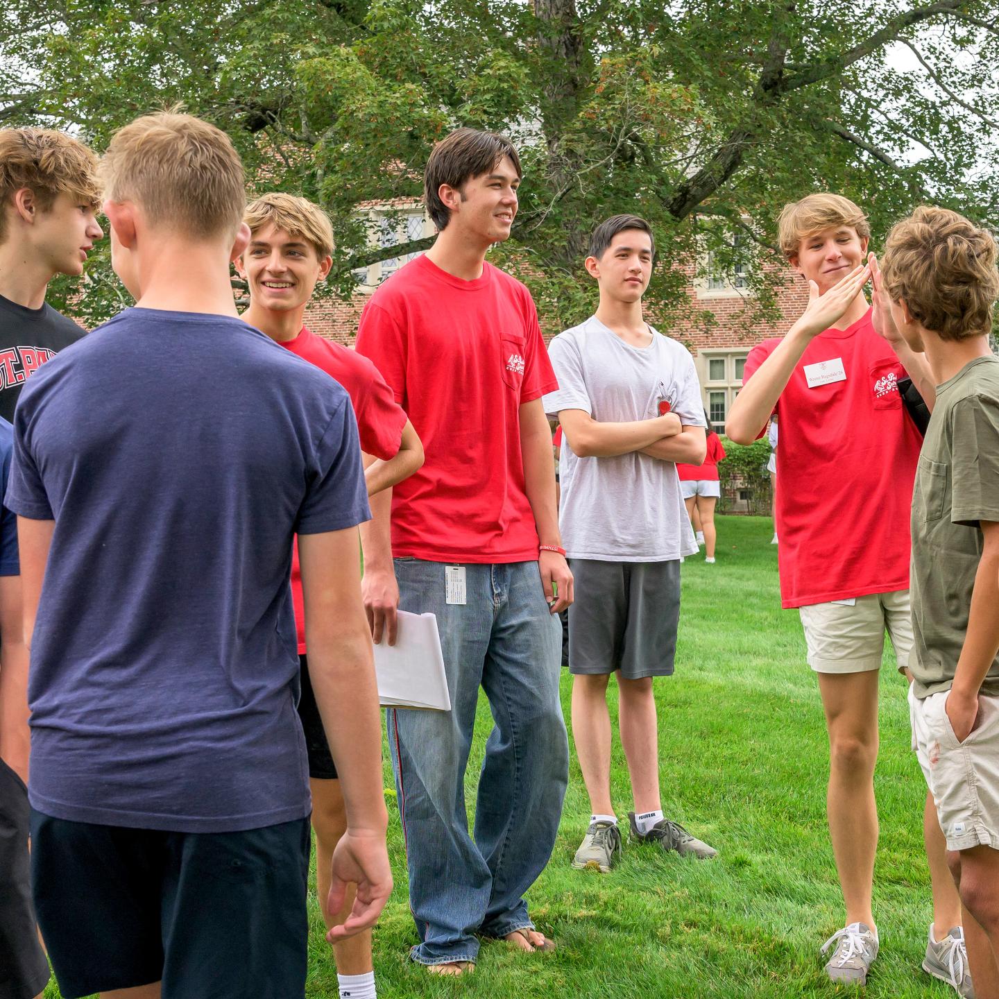 Thomas Armstrong with new students during Orientation on Opening Day 2025