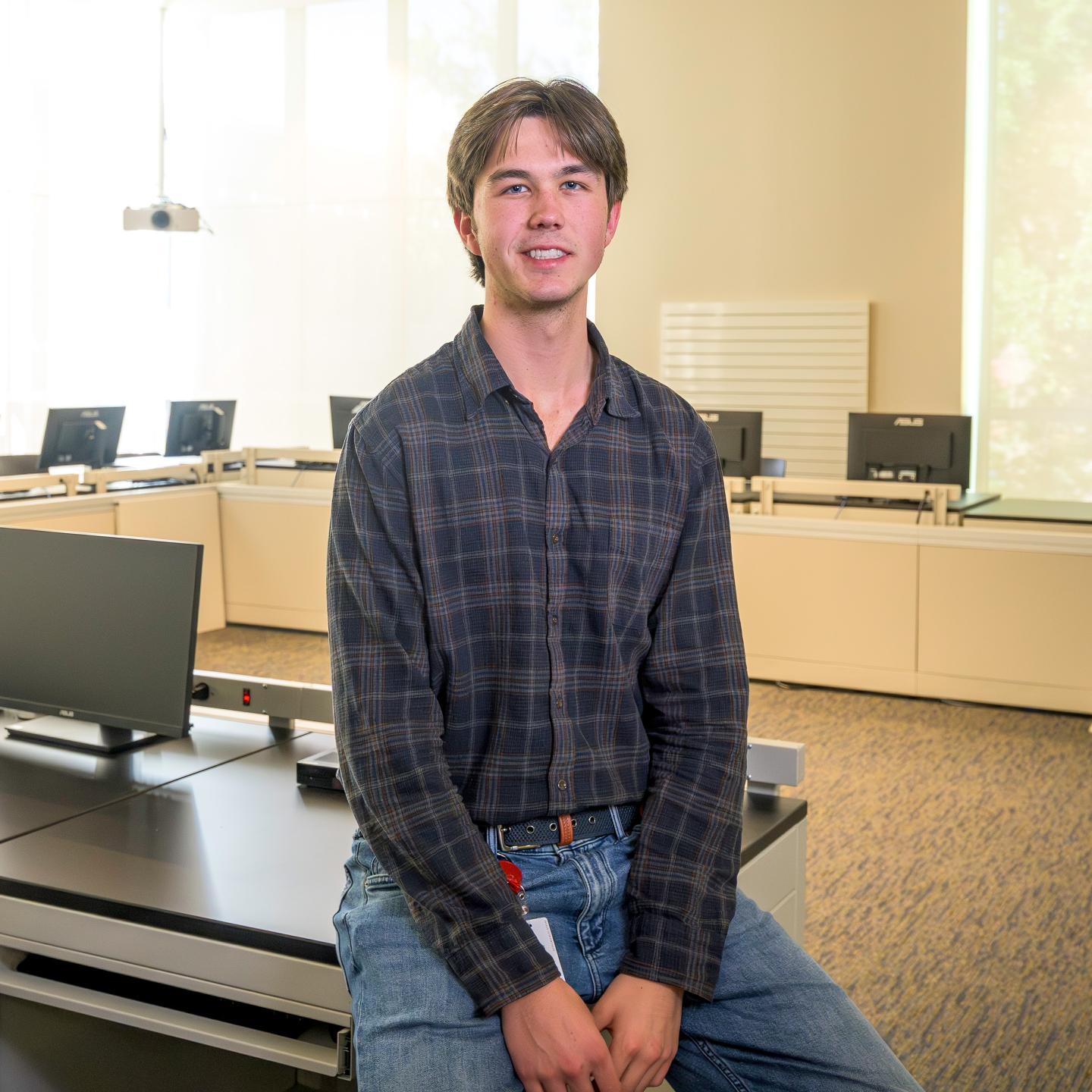 Thomas Armstrong in the Science-on-a-Sphere Room in the Lindsay Center for Math and Science