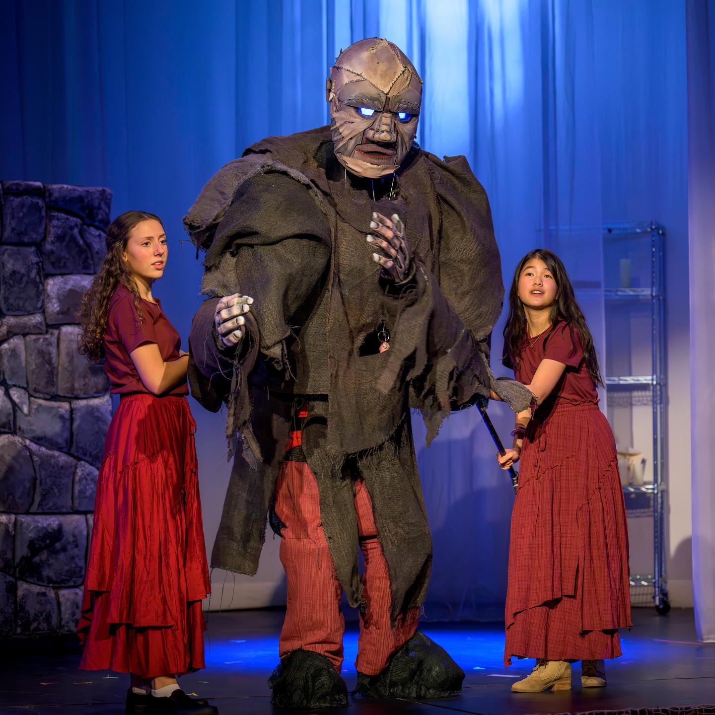 Alexandra Cao controlling the arm in production of "Frankenstein"