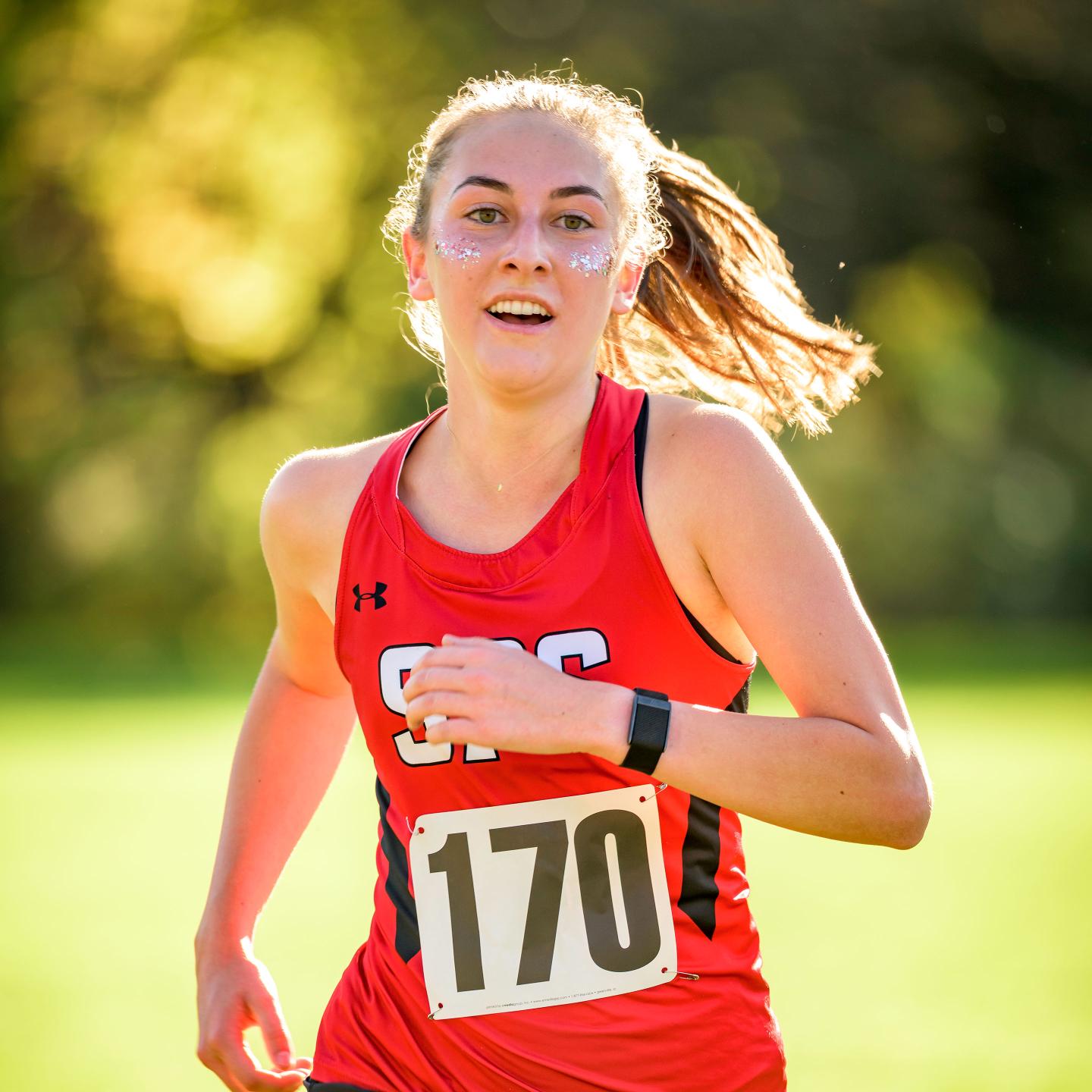 Claire in a XC meet during Family Weekend