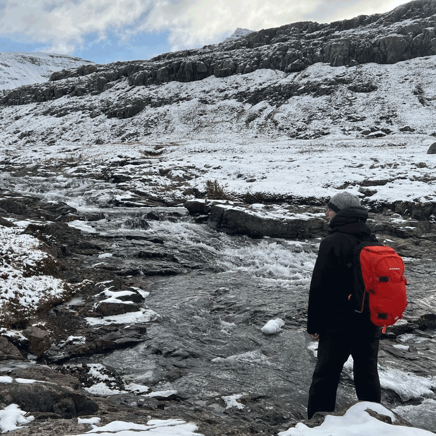 Kyle Pellerin surveys a remote stream in Iceland