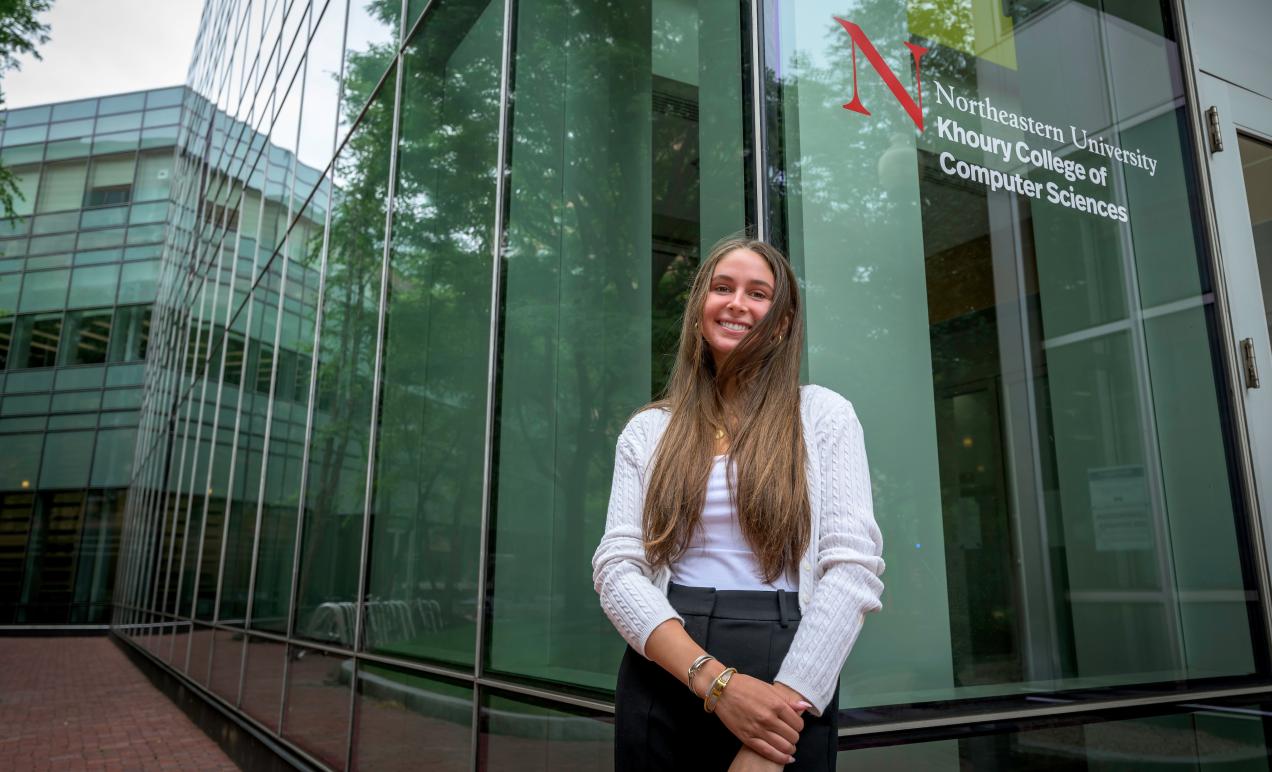 Carly Bigelow outside Khoury College of Computer Science at Northeastern University