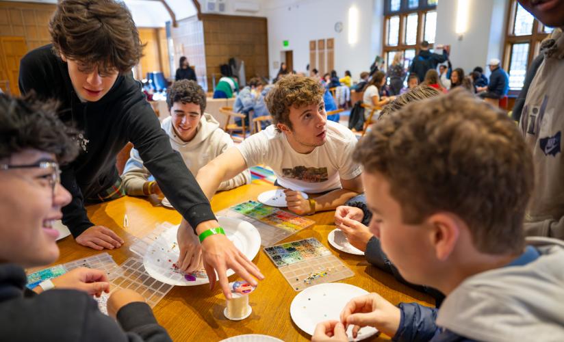 Students gather around a crafts station in Friedman during a wellness themed LinC Day