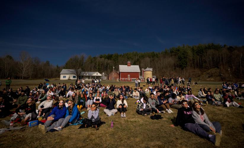 Students experiencing solar eclipse at Foote Brook Farm