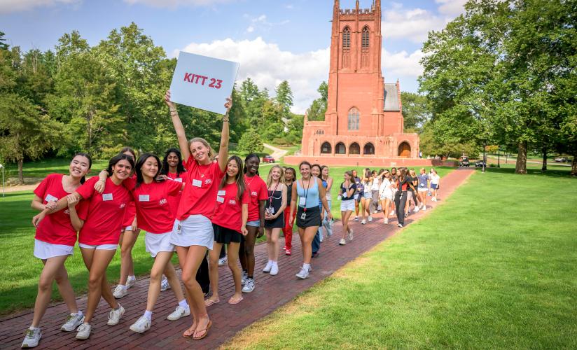 Prefects leading new students to their dorm