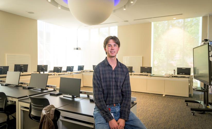 Thomas Armstrong in the Science-on-a-Sphere Room in the Lindsay Center for Math and Science
