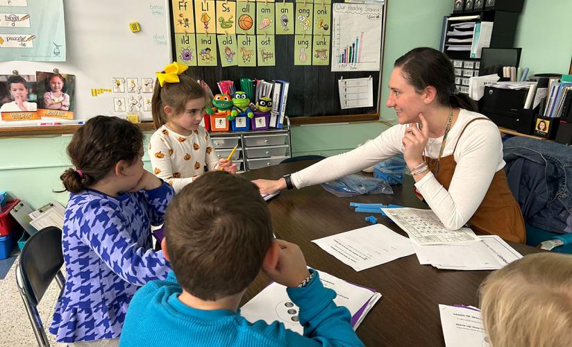 Shoshana Foster ASP’10 with students in her classroom