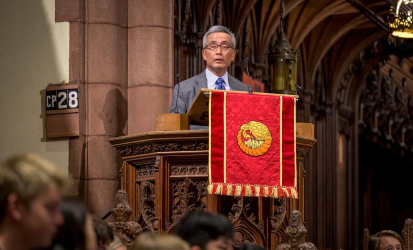 Bruce Chan '74 speaking in Chapel