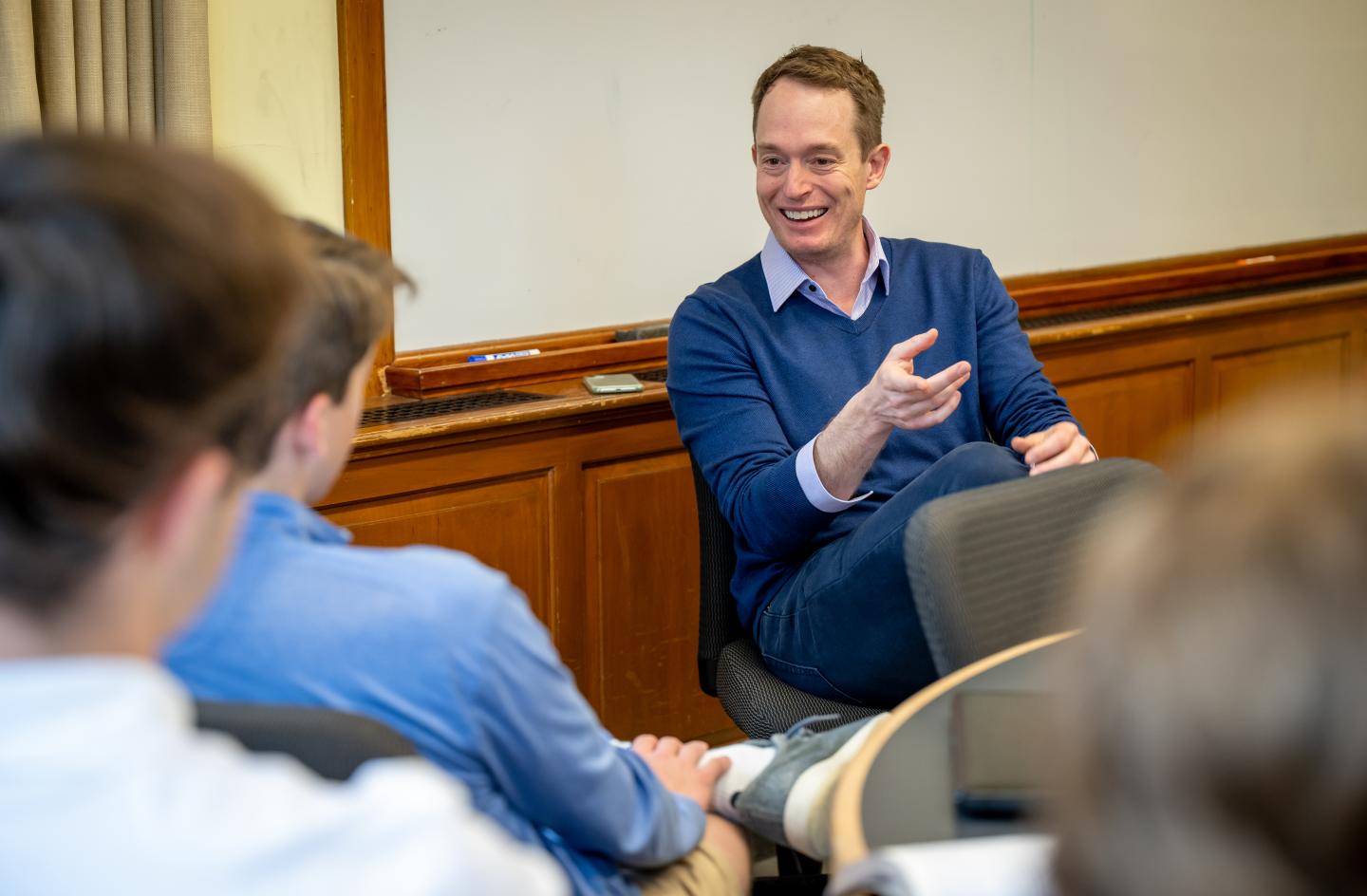 Jonathan Brunstedt speaks with student in classes