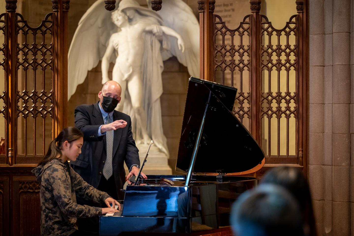 Matthew Odell works with student Ally Hu