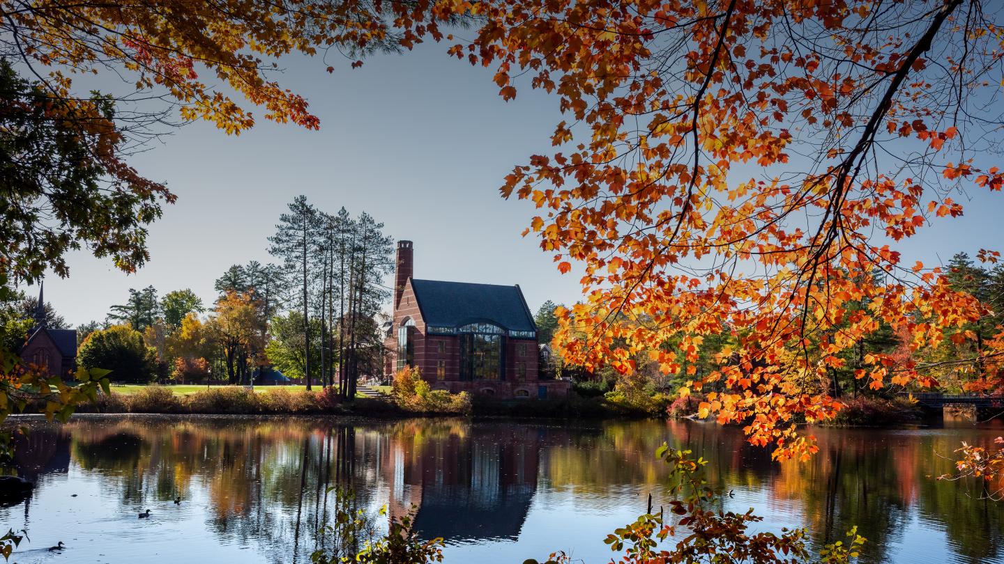 Ohrstrom Library across Lower School Pond in the Fall