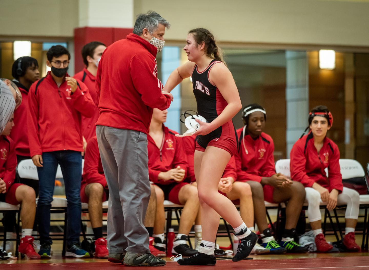 Lilly Fitzpatrick with Coach Heitmiller