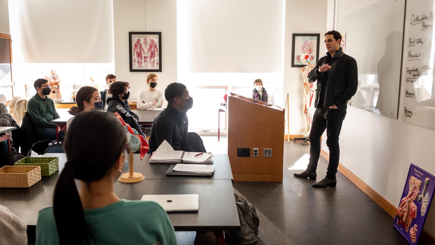 Will Ahmed speaking to students in physiology class