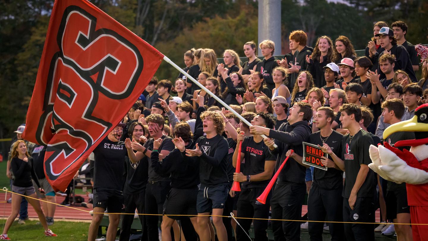 Fans at football night game