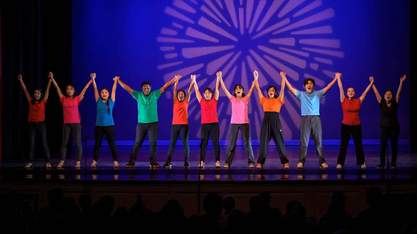 Theater Cast taking a bow on stage.