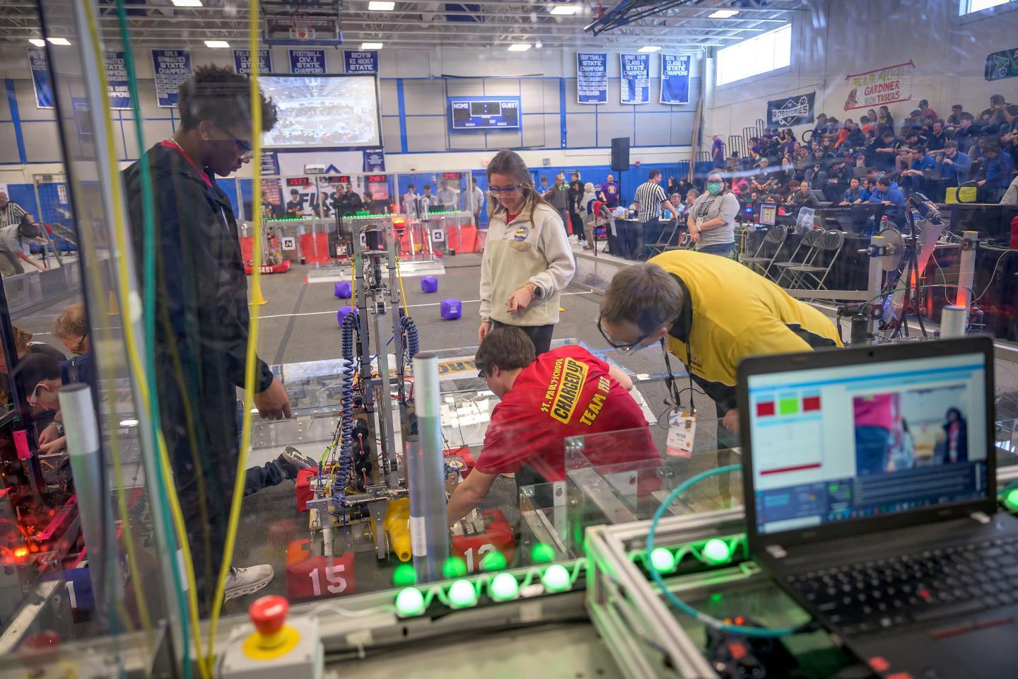 Students at FIRST Robotics competition