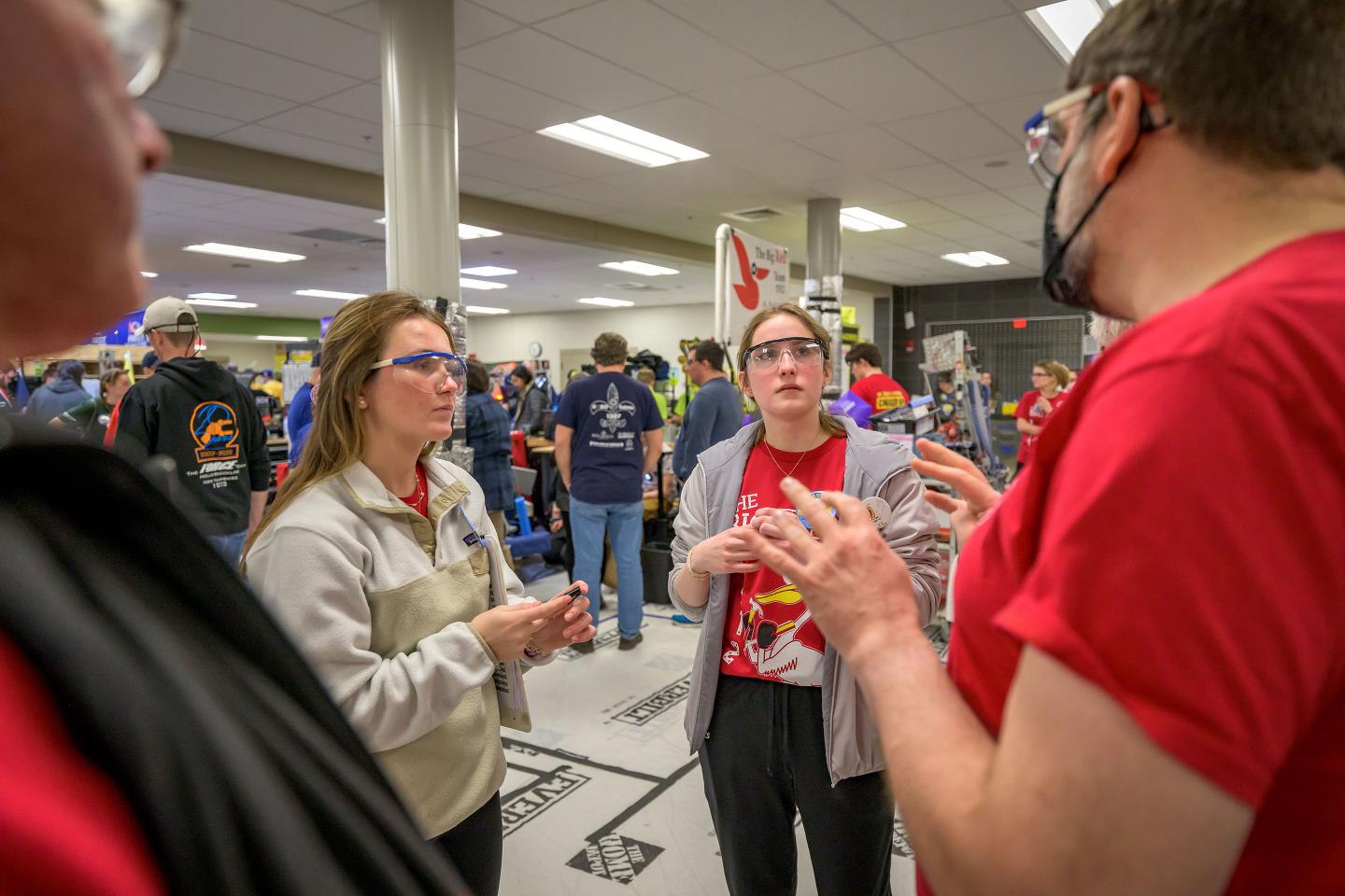 Students at FIRST Robotics competition