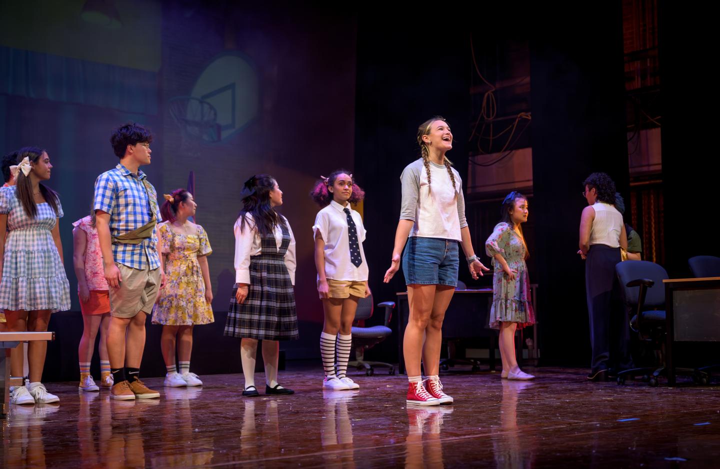Students on-stage during the performance of "The 25th Annual Putnam County Spelling Bee"