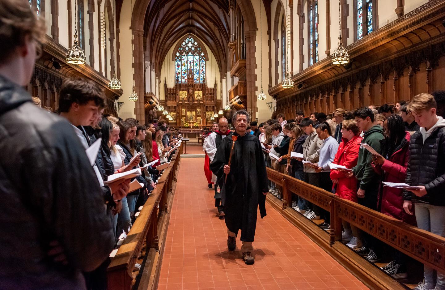 Rick Pacelli as verger leading spring convocation procession