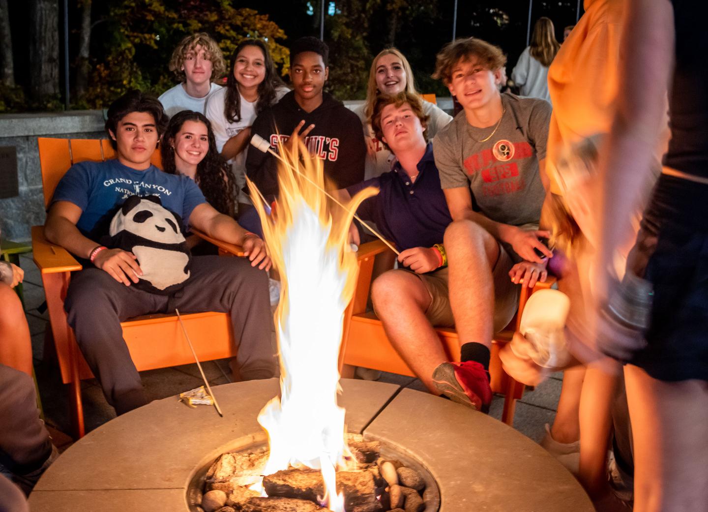 Carson at the firepit with friends