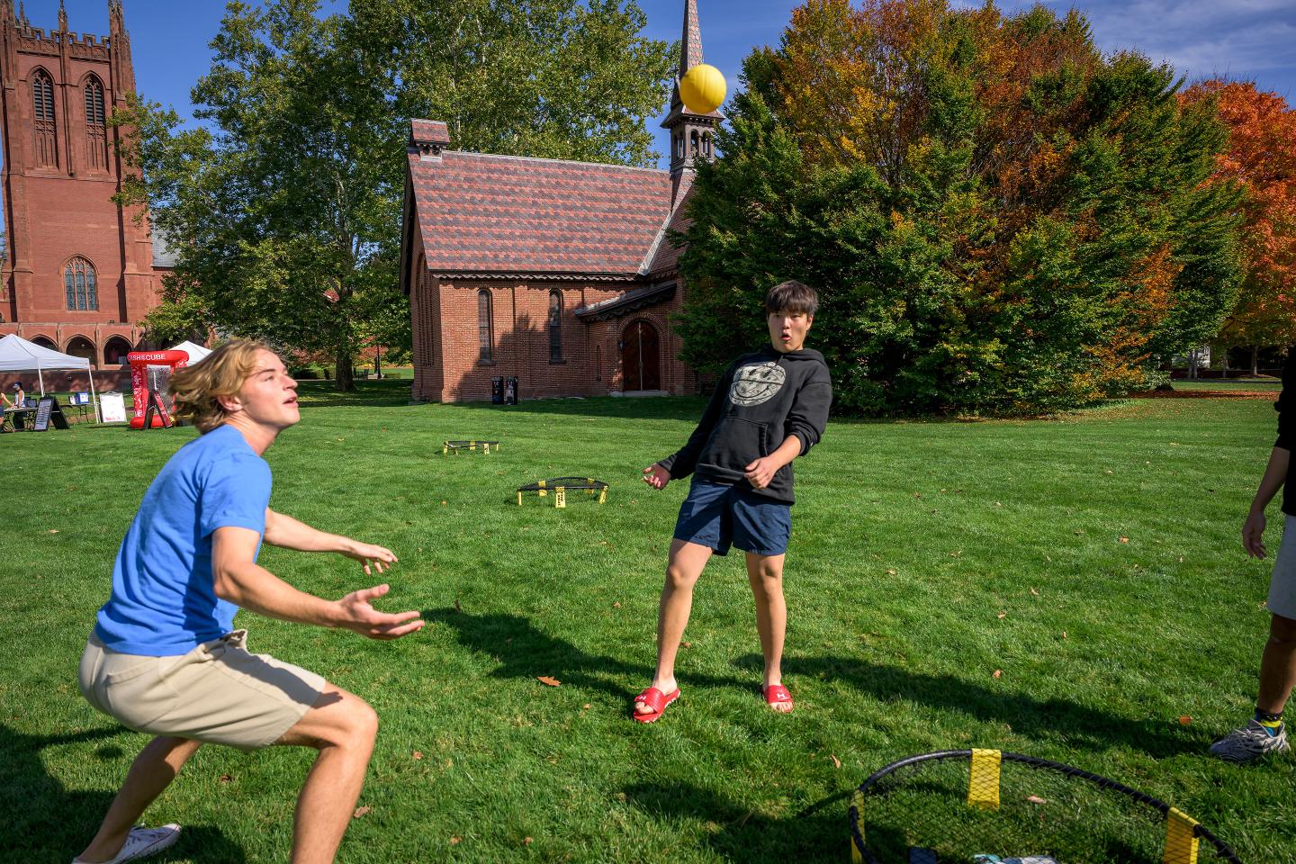 Sebastian playing spikeball on Chapel lawn