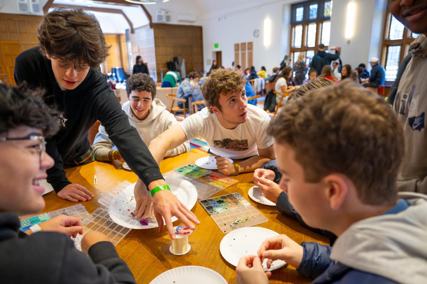 Students gather around a crafts station in Friedman during a wellness themed LinC Day