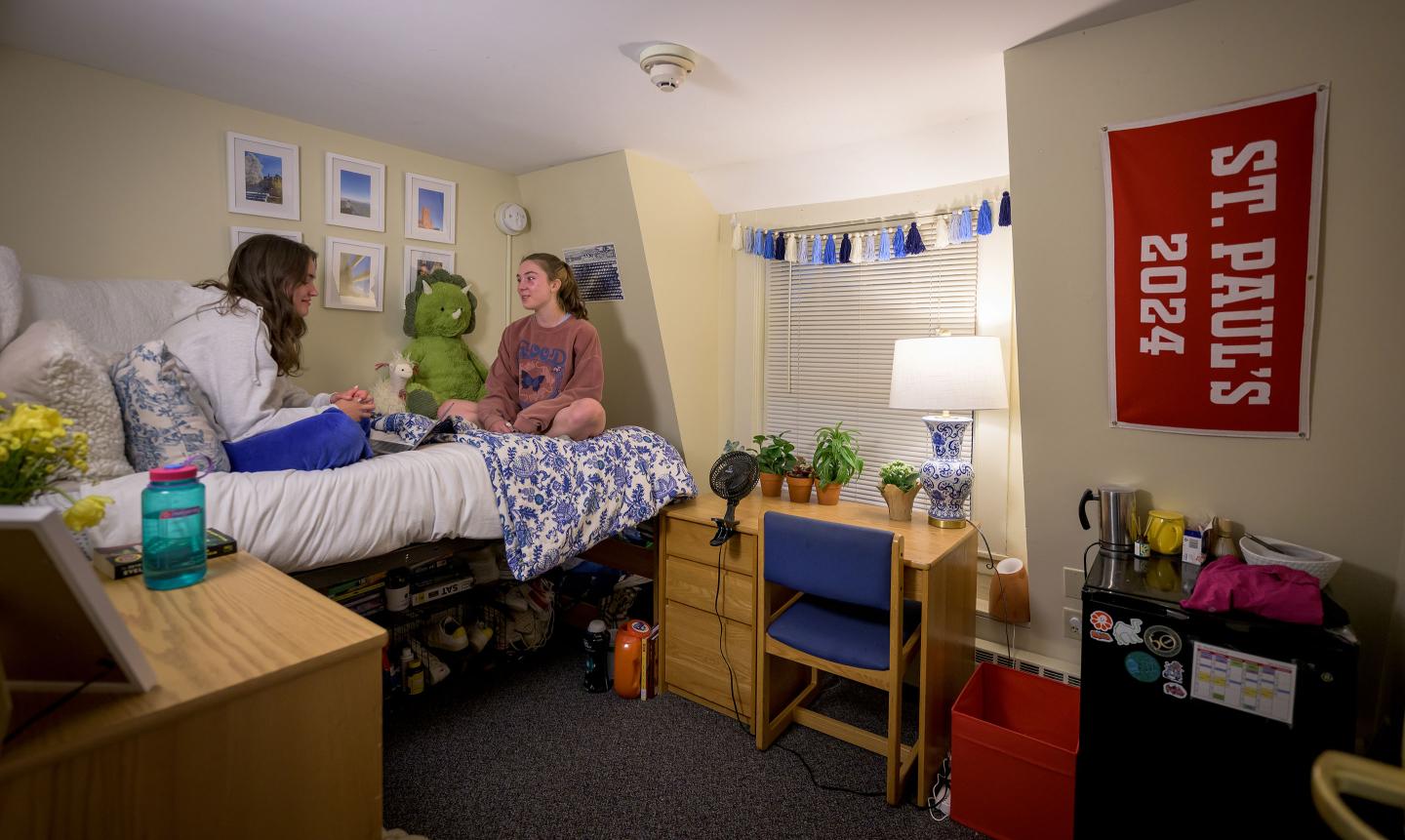 Girls chatting in dorm room