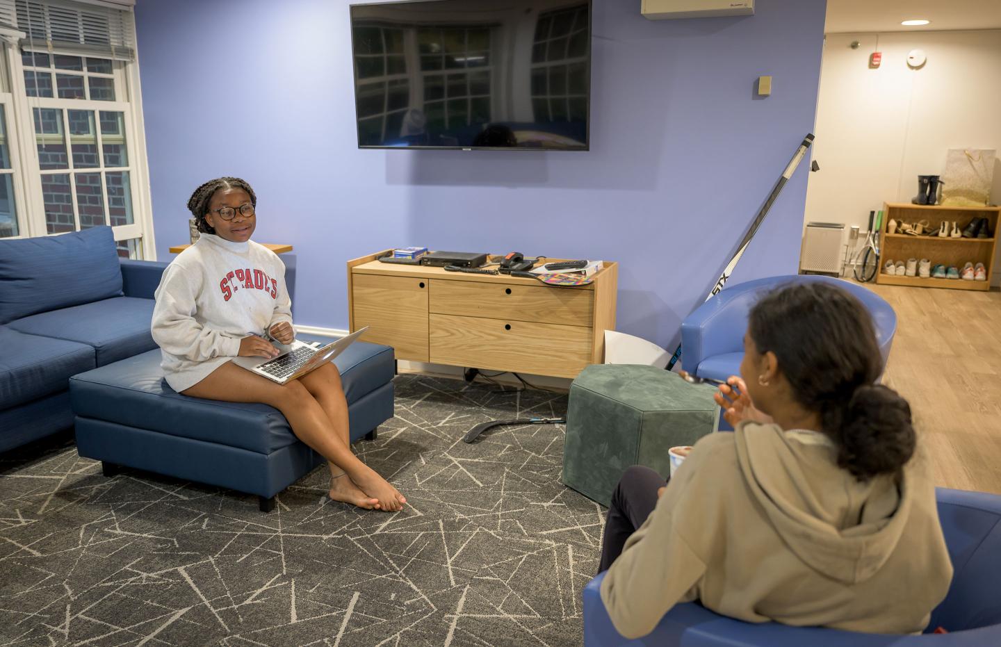 Students in common room in Warren House