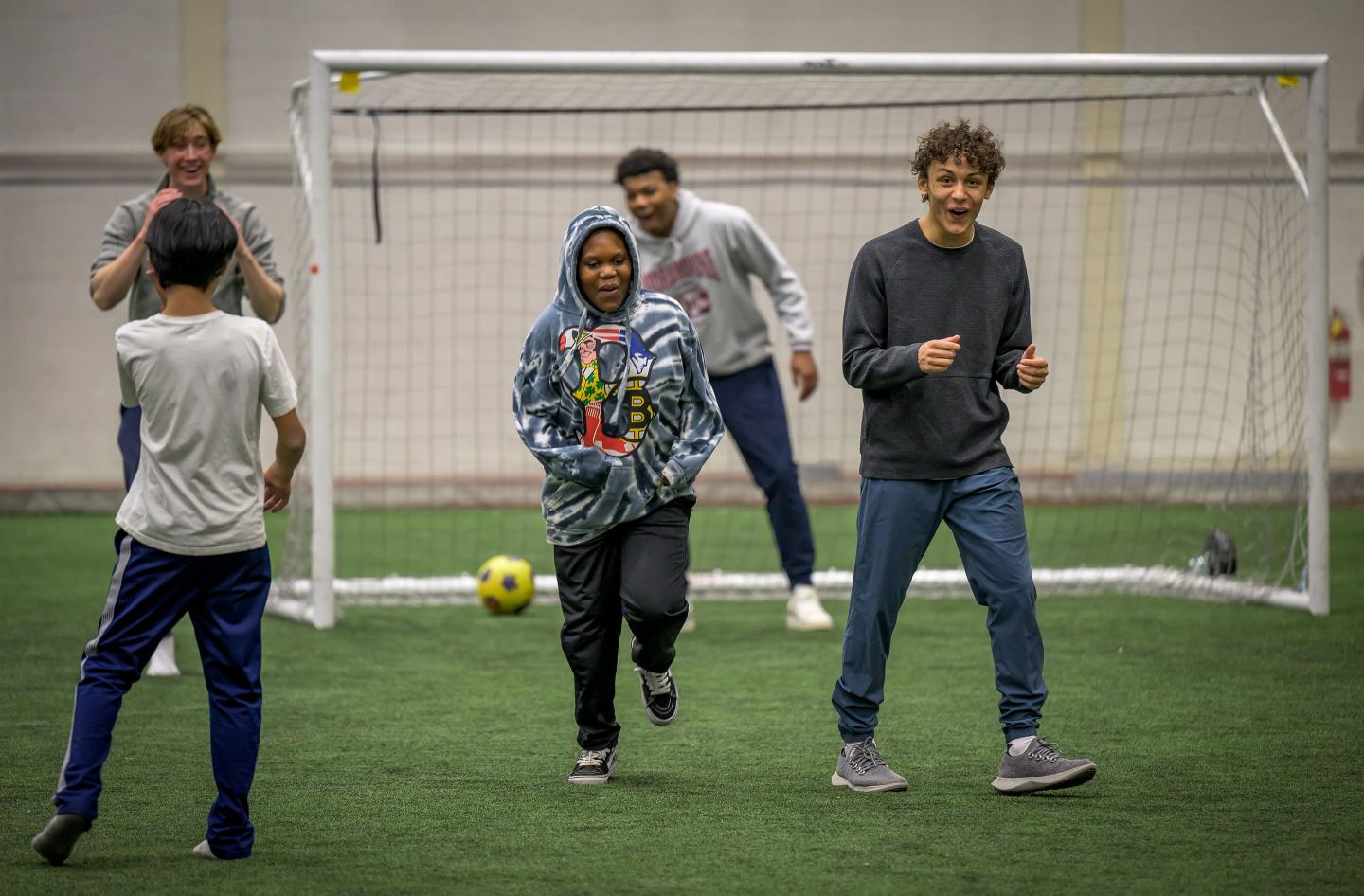 Playing soccer with Friends Program mentees