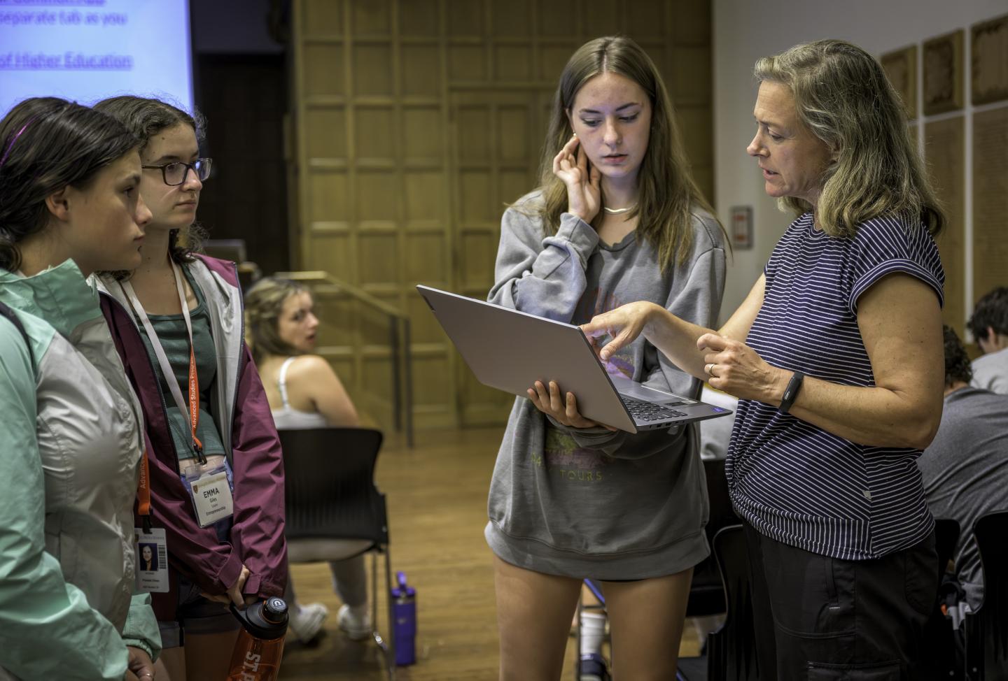 Students meet get feedback on their college application letters from Advanced Studies Program Faculty at St. Paul's School.