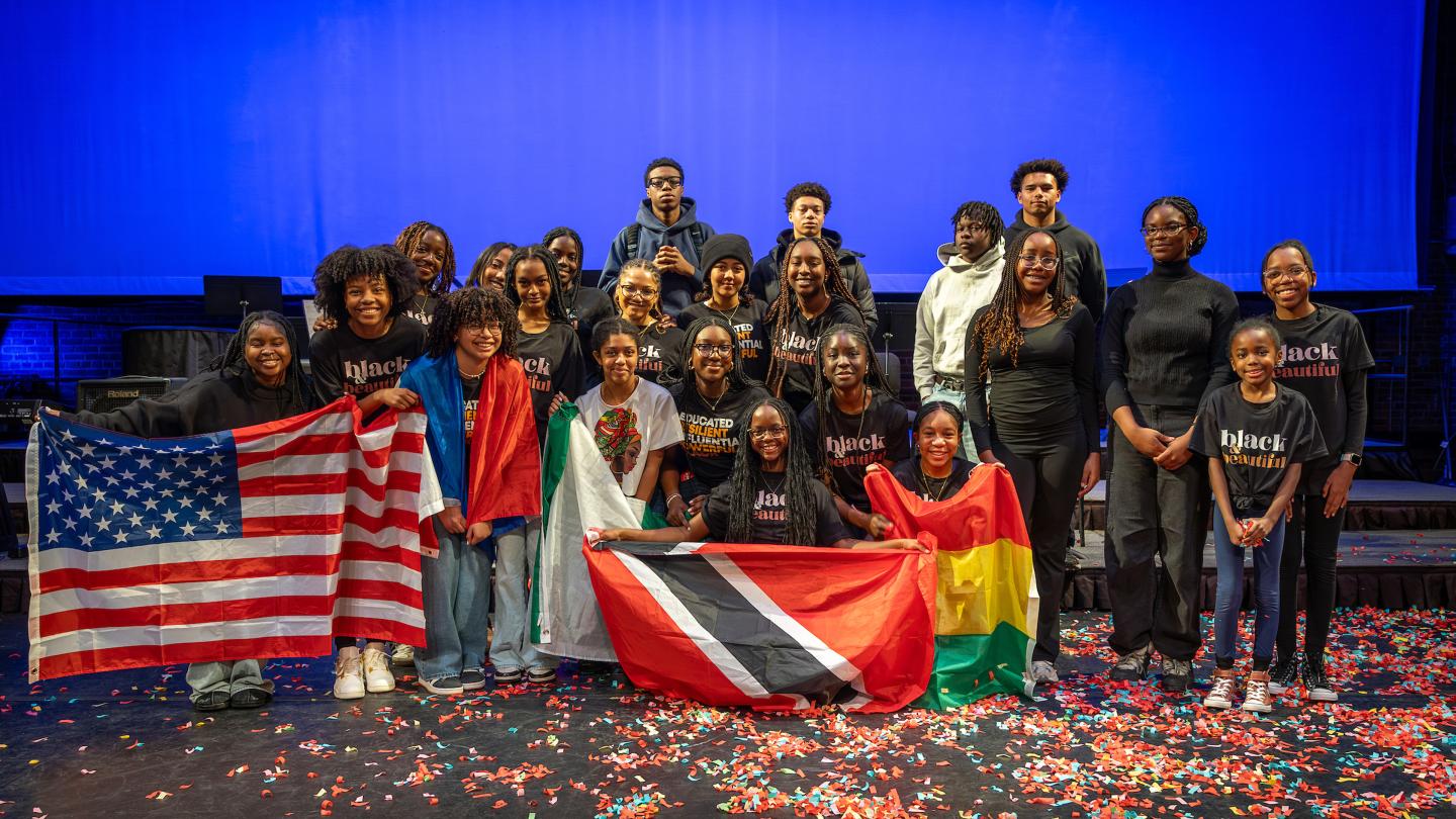 Onyx members pose for a group photo after the 5th Annual Black History Celebration in Memorial Hall at St. Paul's School in Concord, NH.
