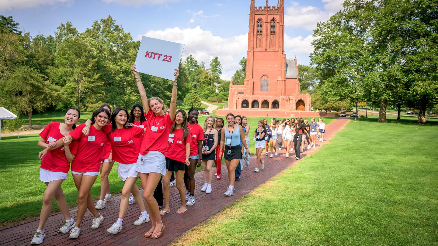 Prefects leading new students to their dorm