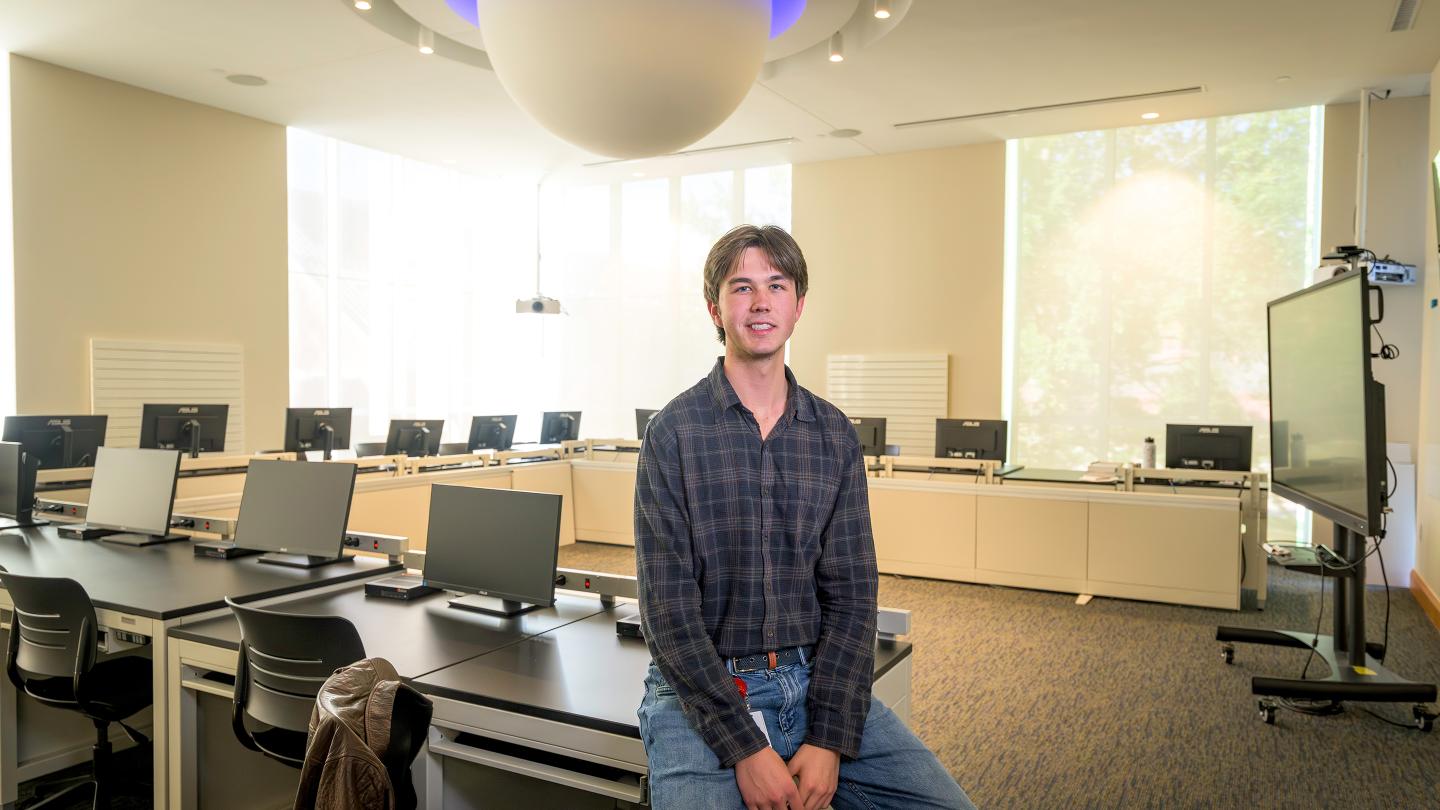 Thomas Armstrong in the Science-on-a-Sphere Room in the Lindsay Center for Math and Science