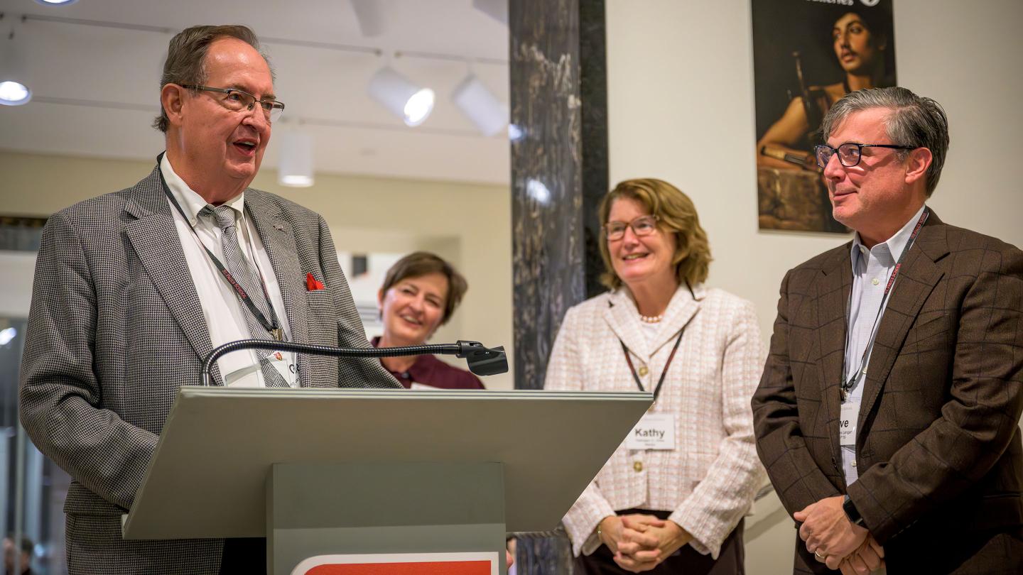 Hicks receiving award at 2025 celebration