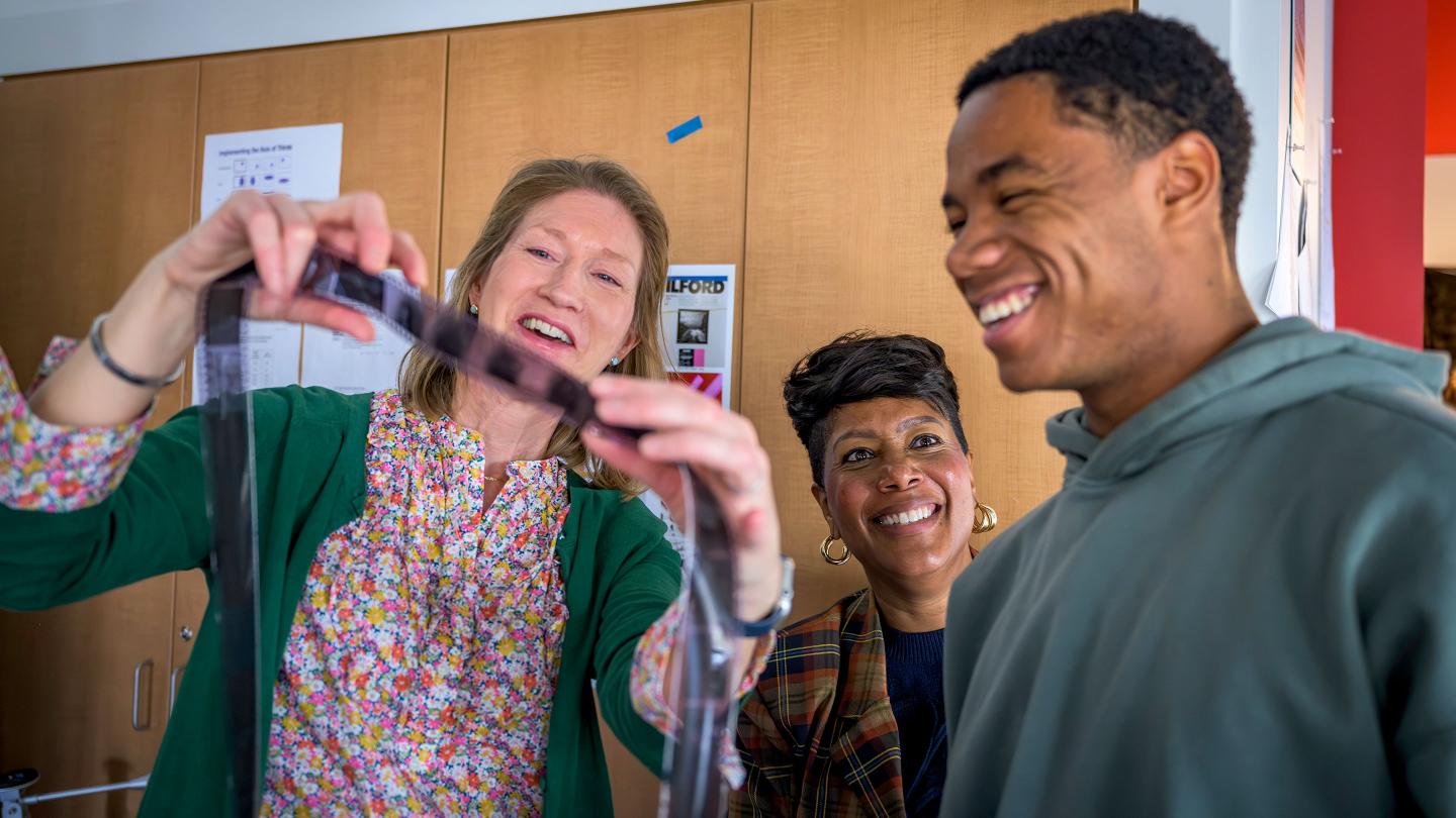 Dr. Angelina Arrington observing Mrs. Magnus' photography class