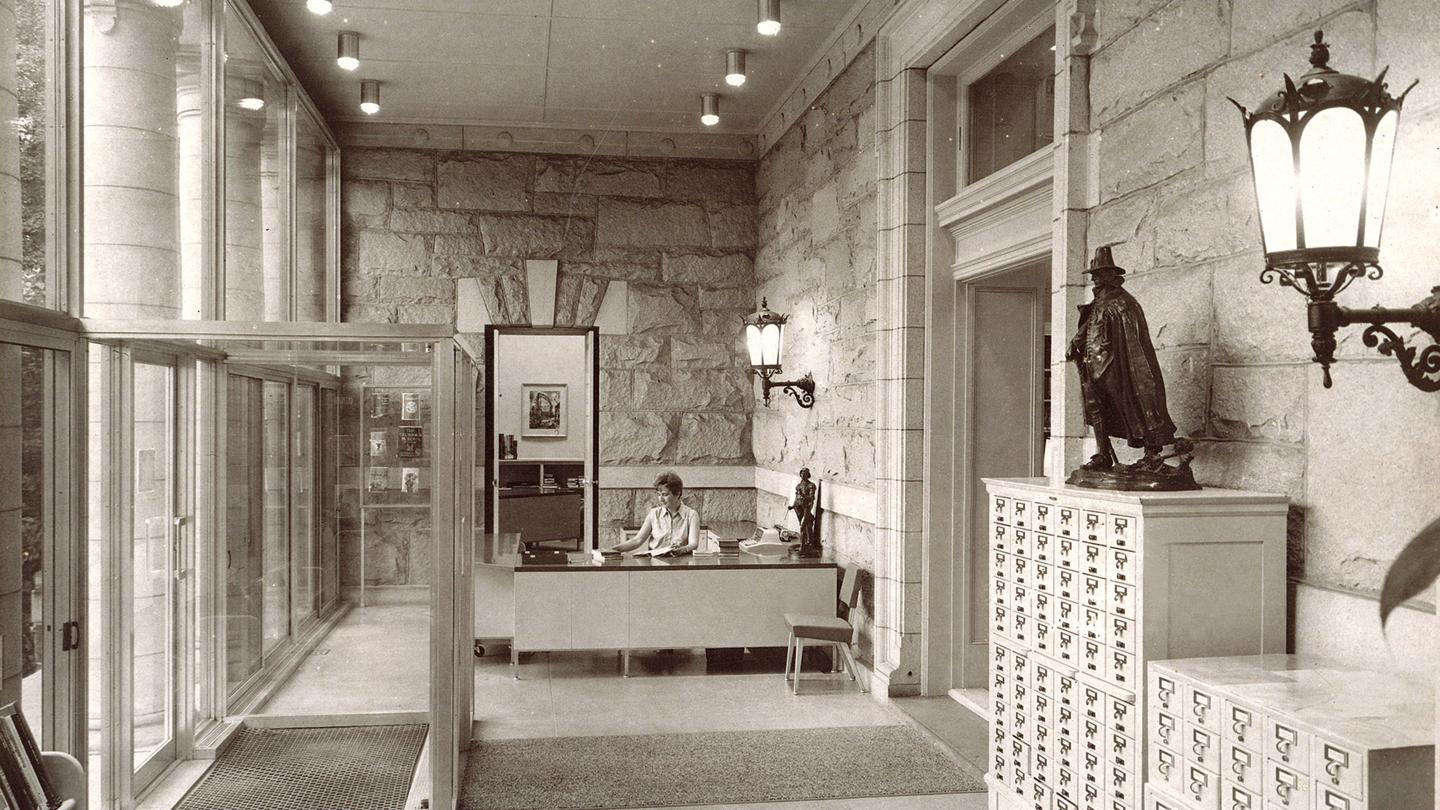Archival photo showing the Sheldon portico enclosed in glass