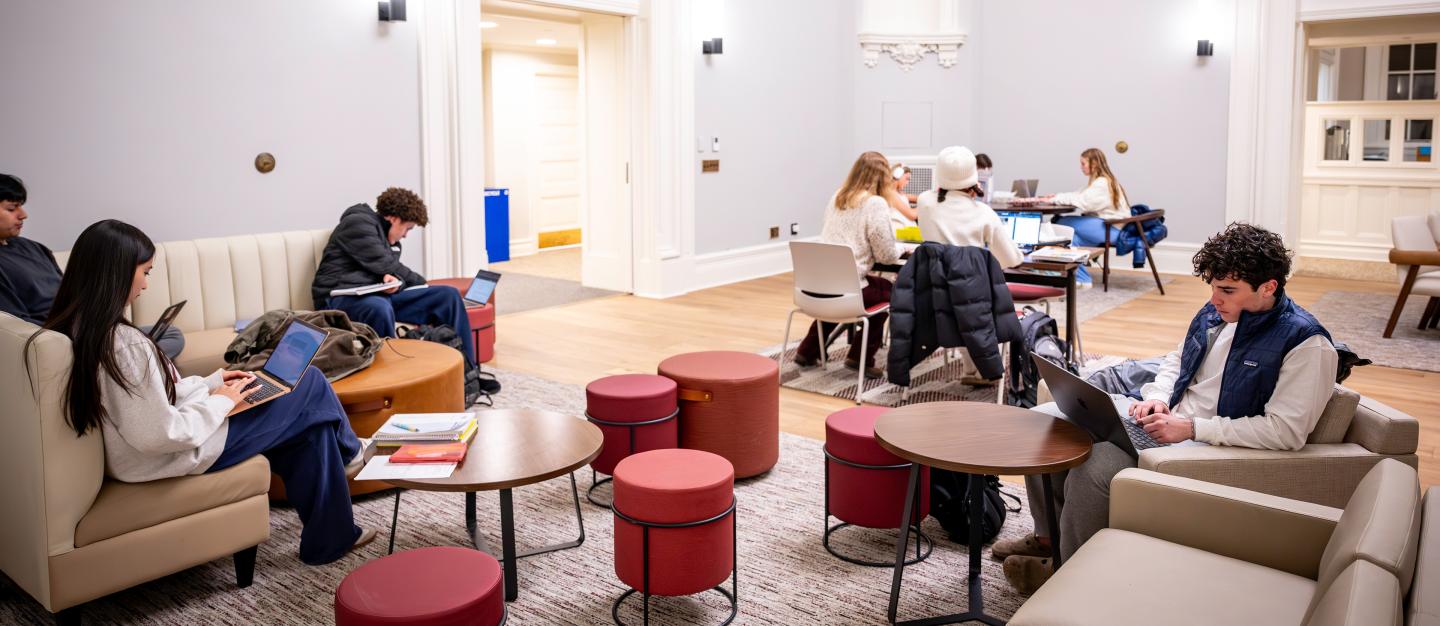 Students studying in the Sheldon rotunda during the evening