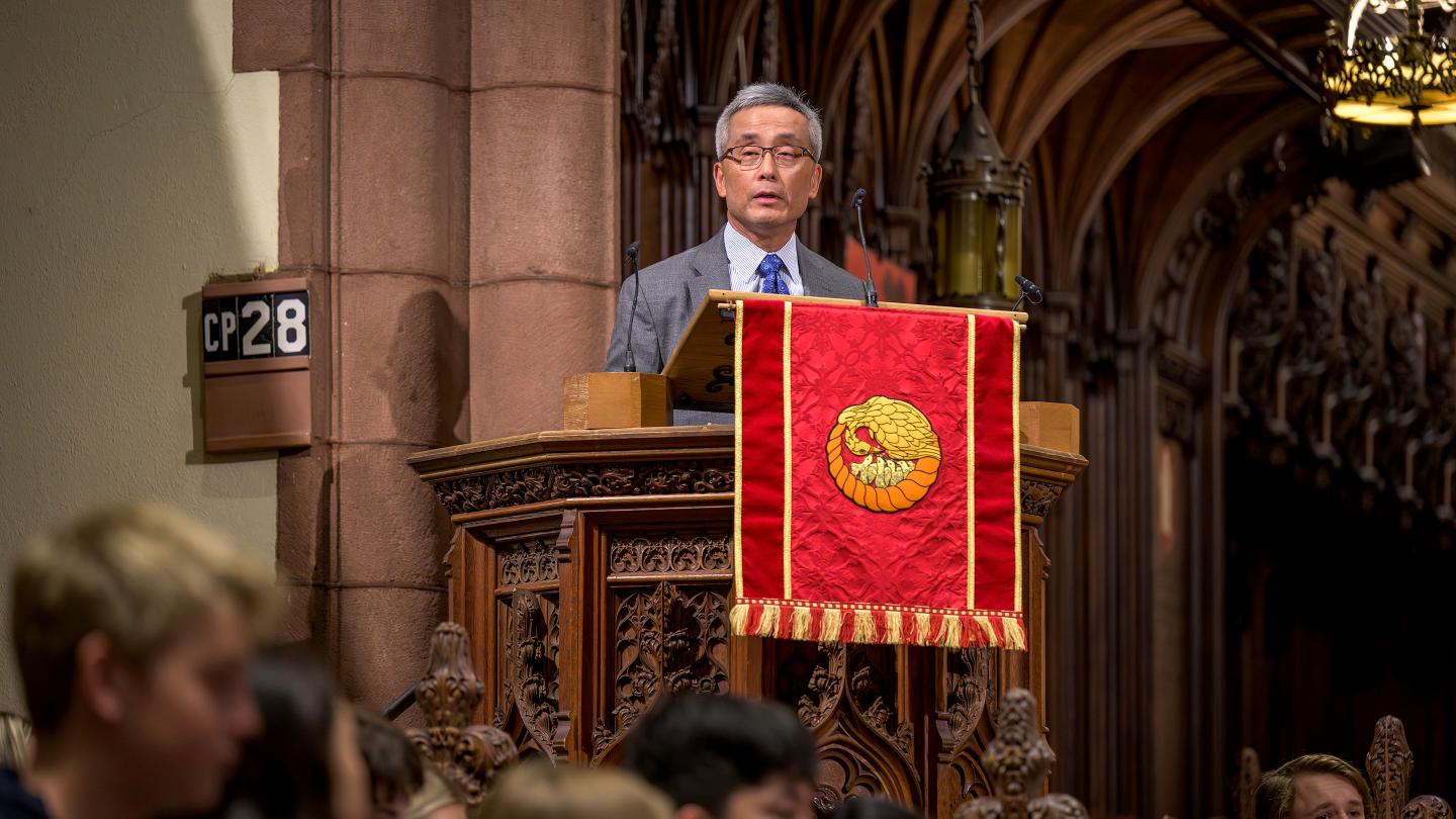 Bruce Chan '74 speaking in Chapel