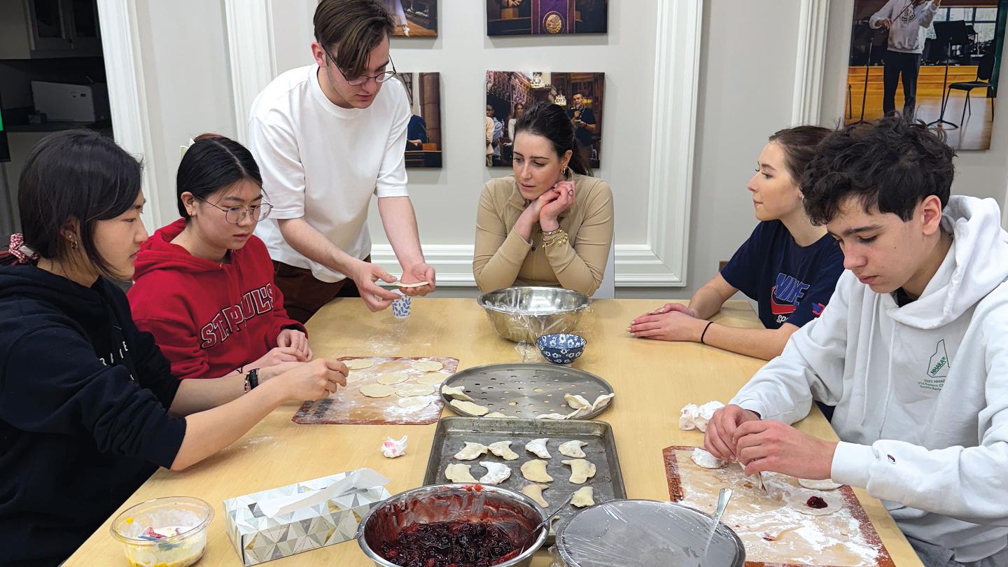 Ukranian Club members teaching students to make varenyky
